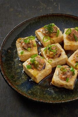  Le Toufu Rou: Un Délice Umami et Solidement Ancrées dans la Tradition Culinaire de Ji'an!